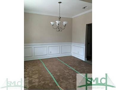 Dining Room. Dining room with wainscoting and hard