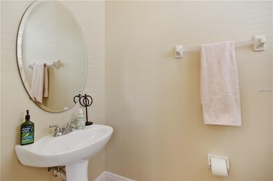 Half bathroom on second floor with kitchen, living