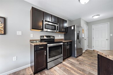 Kitchen has tons of storage and counter space - an