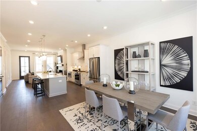 This floorplan feels so airy and spacious. Photos 