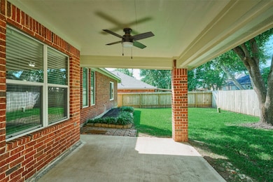 Close up of covered back patio.   The home is all