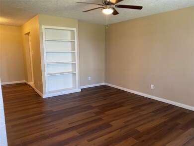 View from front door. Recently installed laminate and freshly painted.