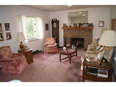 Living Room. The large living room features a fireplace!