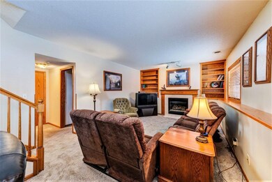FAMILY ROOM JUST STEPS FROM KITCHEN FEATURES QUALI
