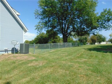 907 N Jackson St, Raymore, MO 64083 - photo 6