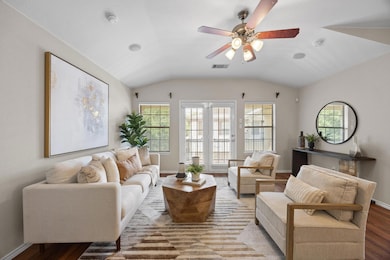 Living room featuring light wood-style flooring, 