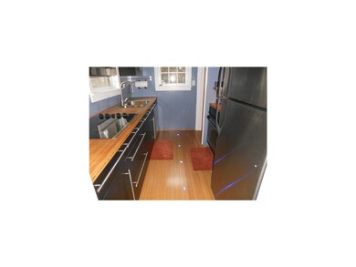 Kitchen. Lighted Bamboo Flooring.
