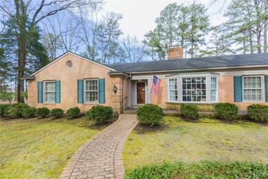 The main house is an all-brick ranch with three be