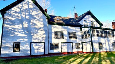7. Back of home with access to basement