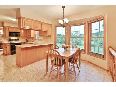 The bayed informal dining area boasts large window