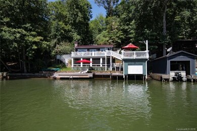 Single boathouse with lift and sundeck, plus extra