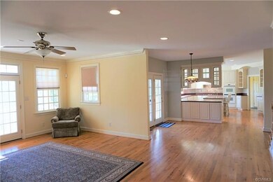 The open floor plan is flooded with natural light.