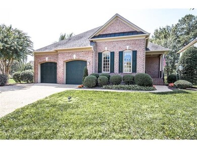 Aggregate double width driveway leads to double ga