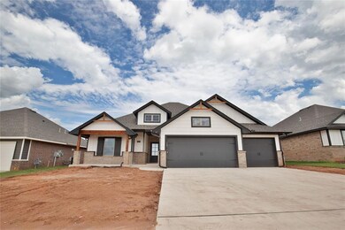 Craftsman house featuring a garage