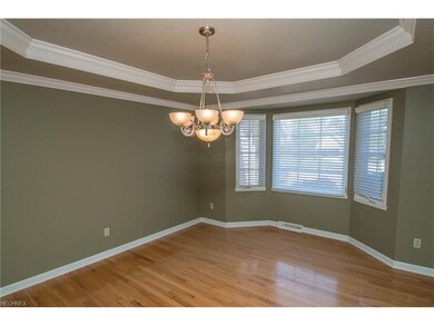 Formal dining room with hardwood floors