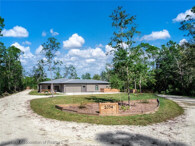1054 Hyacinth Ave, Sebring, FL 33875 - photo 7