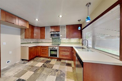 Kitchen featuring light tile patterned flooring, s