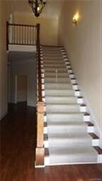 Gorgeous Staircase in The Foyer with a Landing At 