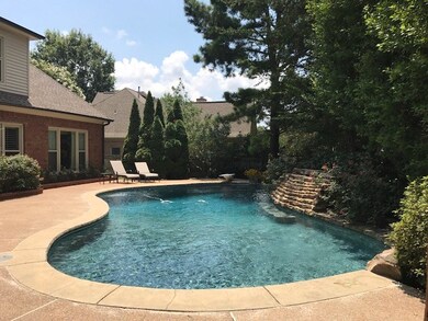Magnificent outdoor living in this gleaming gunite