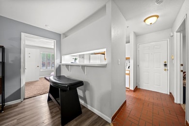 Foyer with baseboards