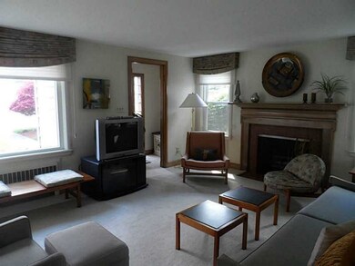 Living Room. living room has wood burning fireplac