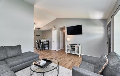Great open floor plan and white trim and paneled d