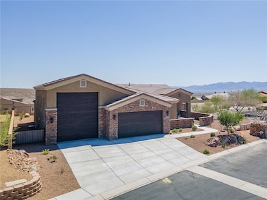 Ranch-style home with an attached garage, driveway