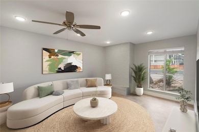 Living area featuring recessed lighting and a cei