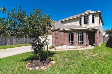 A large front yard and mature landscaping