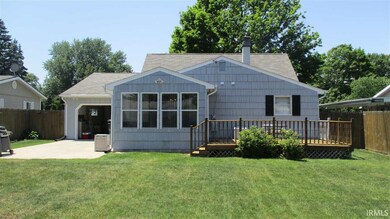 Features Open Patio and Deck off of sunroom