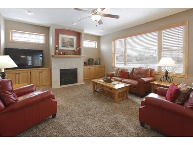 The spacious living room boasts a gas burning fire