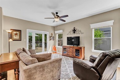Enjoy a spacious great room with access to your de