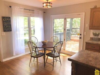 Eat-in kitchen with french doors leading to back deck and gazebo