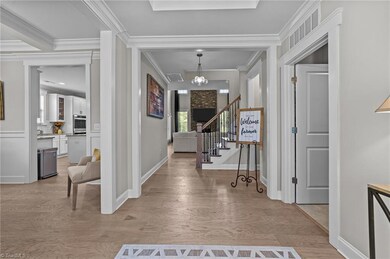 Inviting Foyer with upgraded lighting