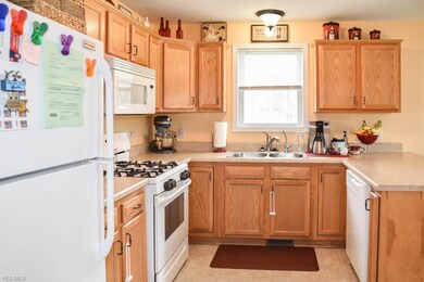The kitchen has great cabinet space and a pantry.