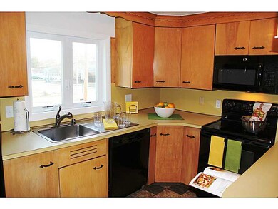 Kitchen. Charming kitchen features all new applian