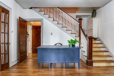 View of front entry and staircase leading to bedro