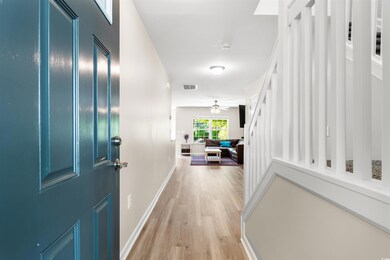 Hallway with light wood-type flooring