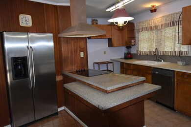 KITCHEN WITH BASEMENT/LAUNDRY ENTRANCE