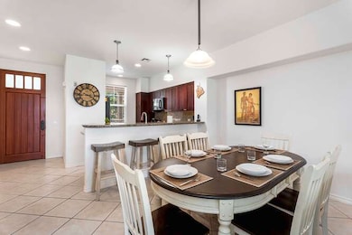 Dinning area, and breakfast bar.