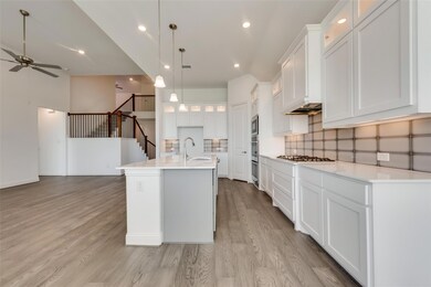 Kitchen featuring light hardwood / wood-style floo