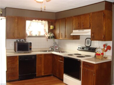 kitchen has laminate floor & includes appliances i