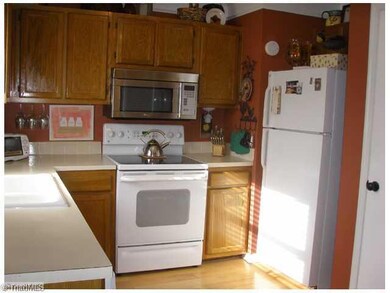 Kitchen. Another view of eat in kitchen