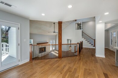 Hallway featuring recessed lighting, visible vents