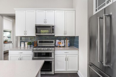 Kitchen featuring stainless steel appliances, dec