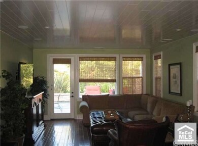 Family room open to kitchen and dining area with d