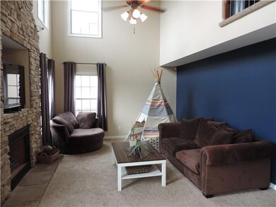 2 STORY LIVING ROOM WITH GAS FIREPLACE.  