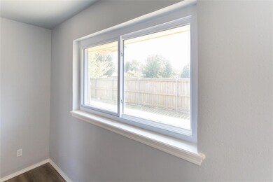 Room details with hardwood / wood-style flooring