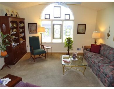 Living Room. Lovely Palladium window is a focal po