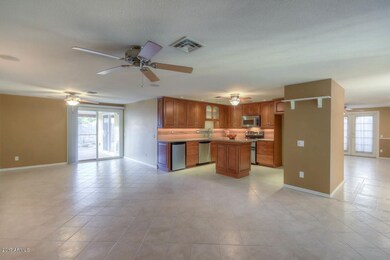 Kitchen with dining area and back door